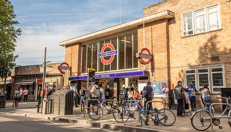 A photo showing the entrance to White City Station in Hammersmith